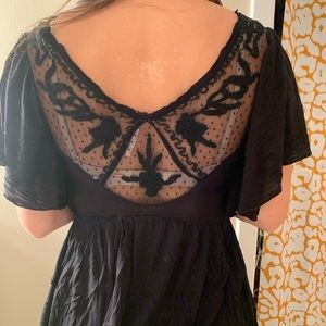 Free people flowy black top.
